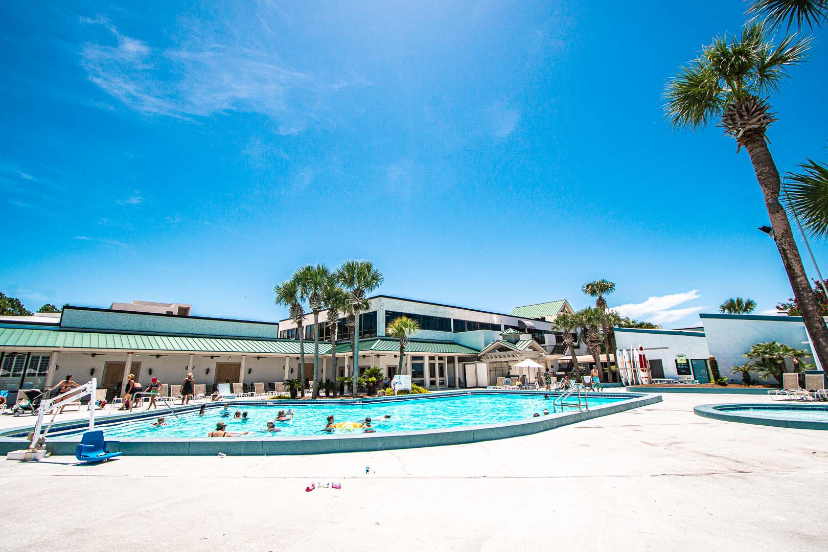 A scenic view of the outdoor swimming pool at VRI's Bay Club of Sandestin in Florida.